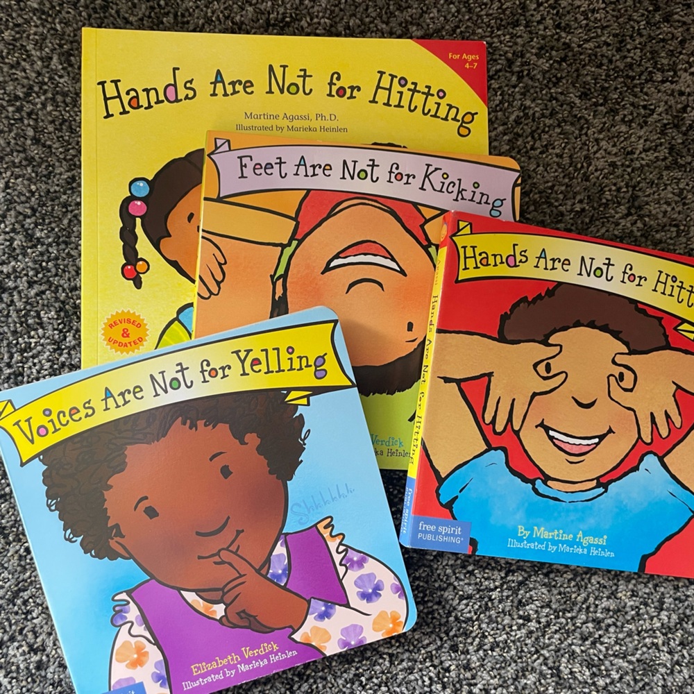 Set of 4 children’s books (hands are not for hitting)